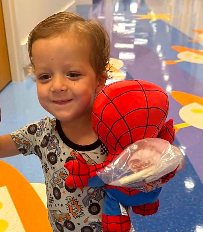 Carter smiling in the hospital hallway