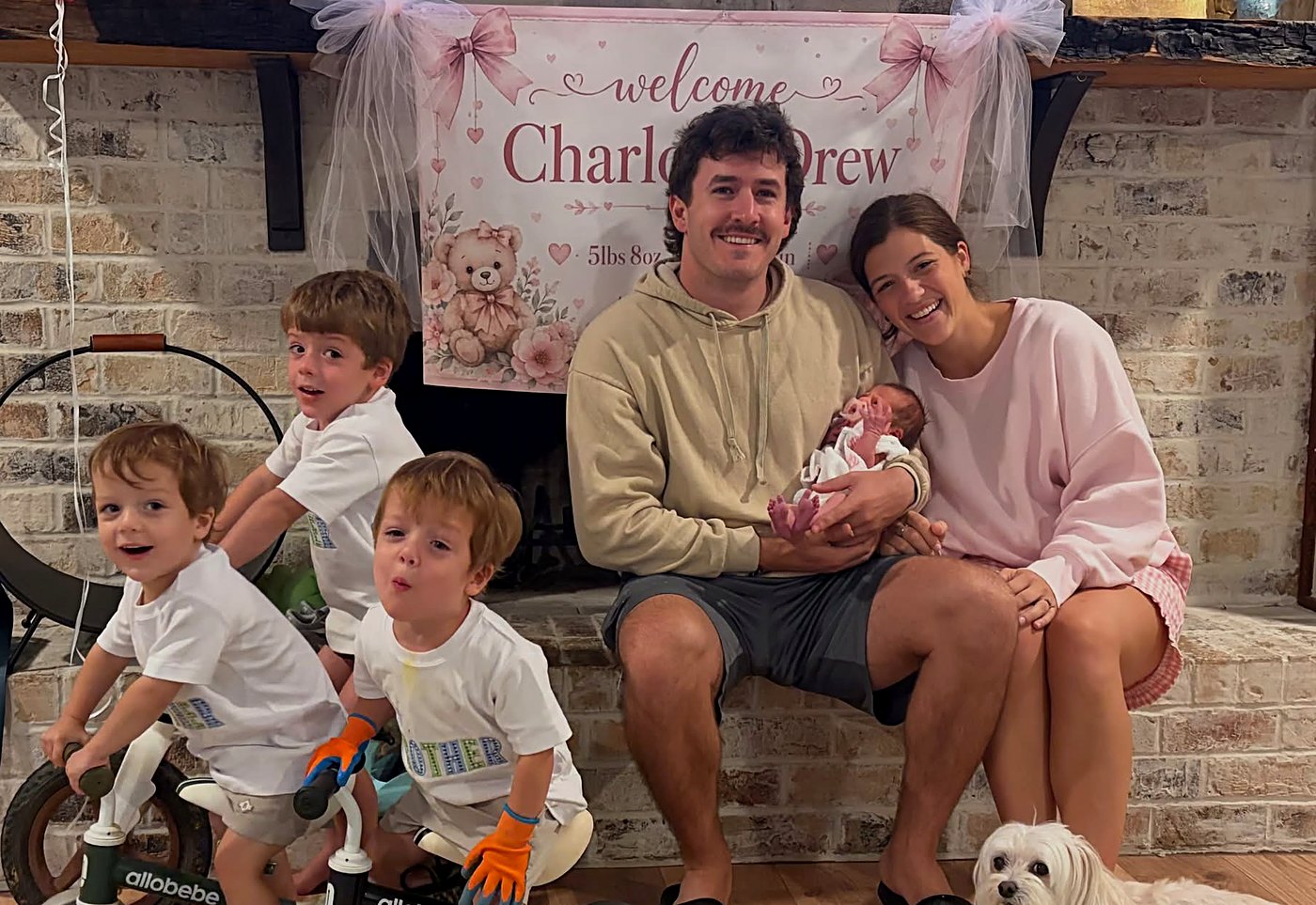 Carter's family at home with his baby sister