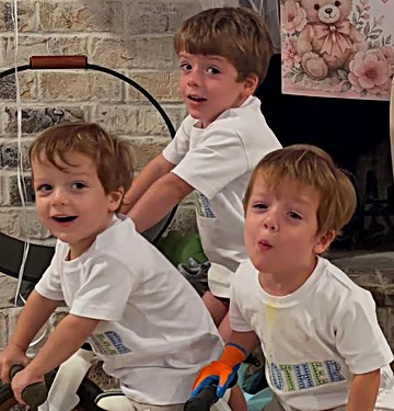 Carter and his brothers at home