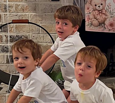 Carter and his brothers at home