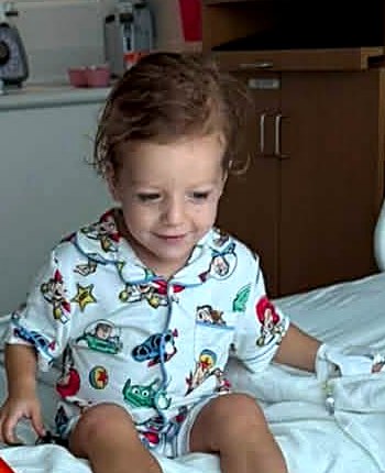 Carter on his hospital bed