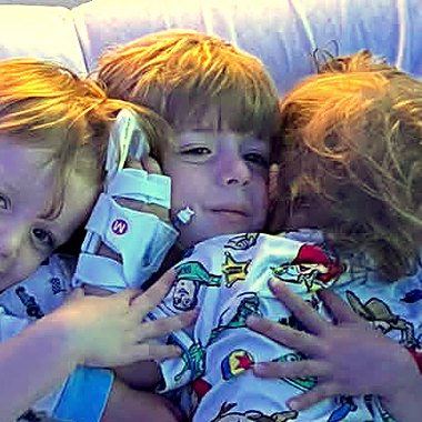 Carter wrapped up with his brothers