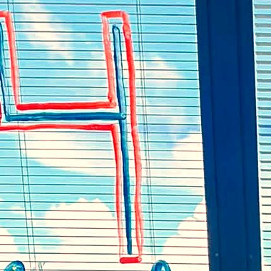 Birthday window art painted on the hospital room window